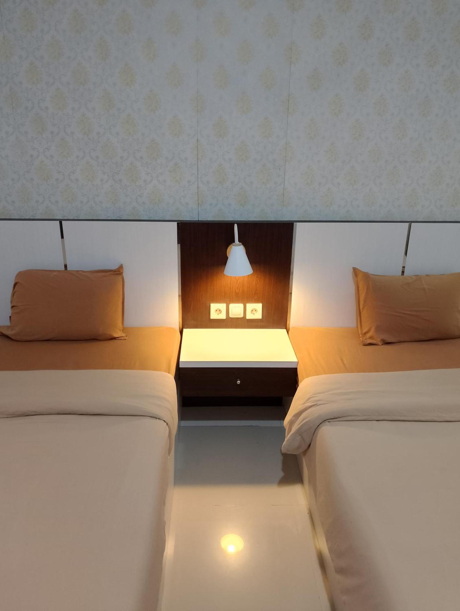 Tembok Batu Hotel